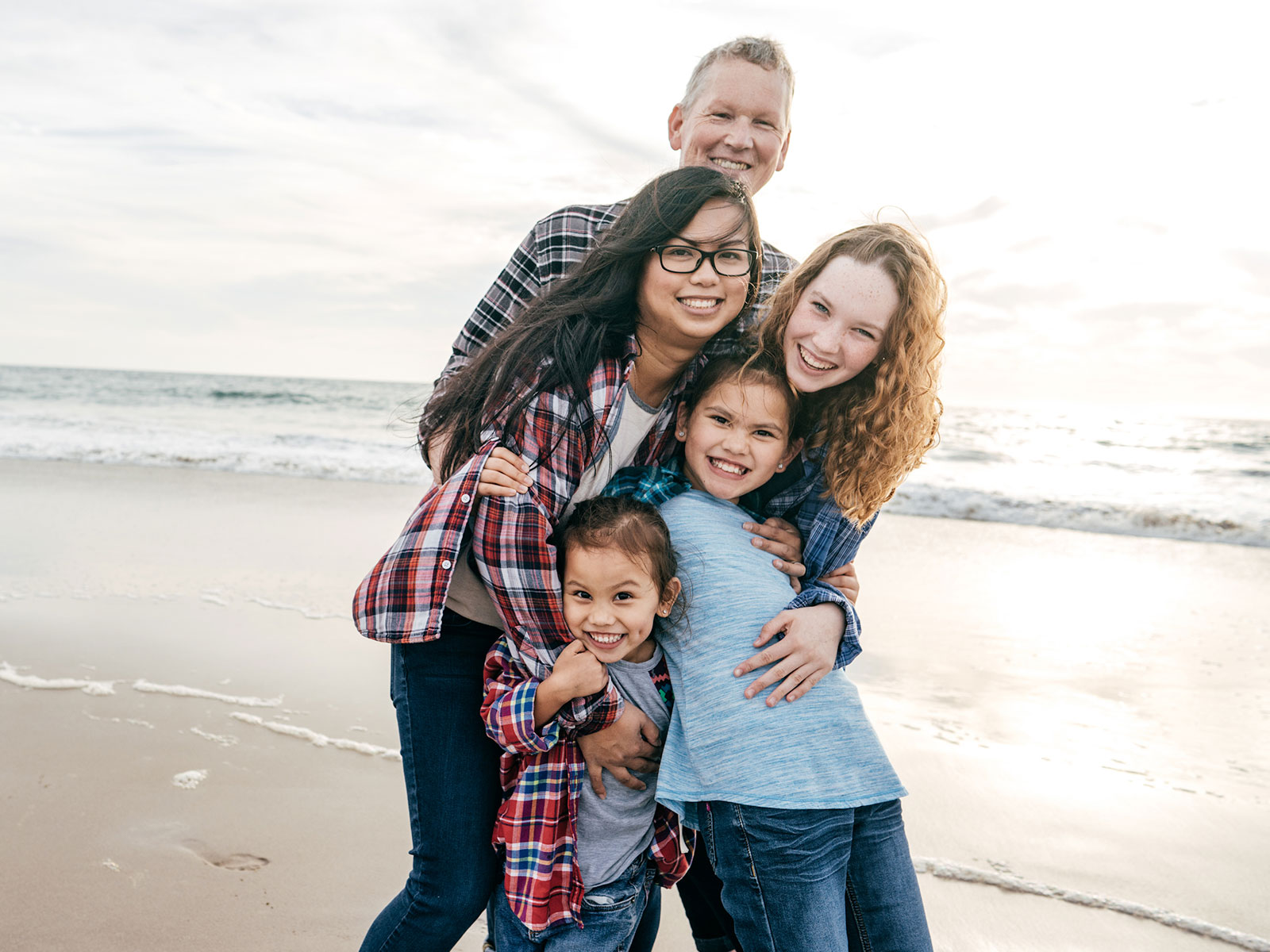 Adoptive family at the beach