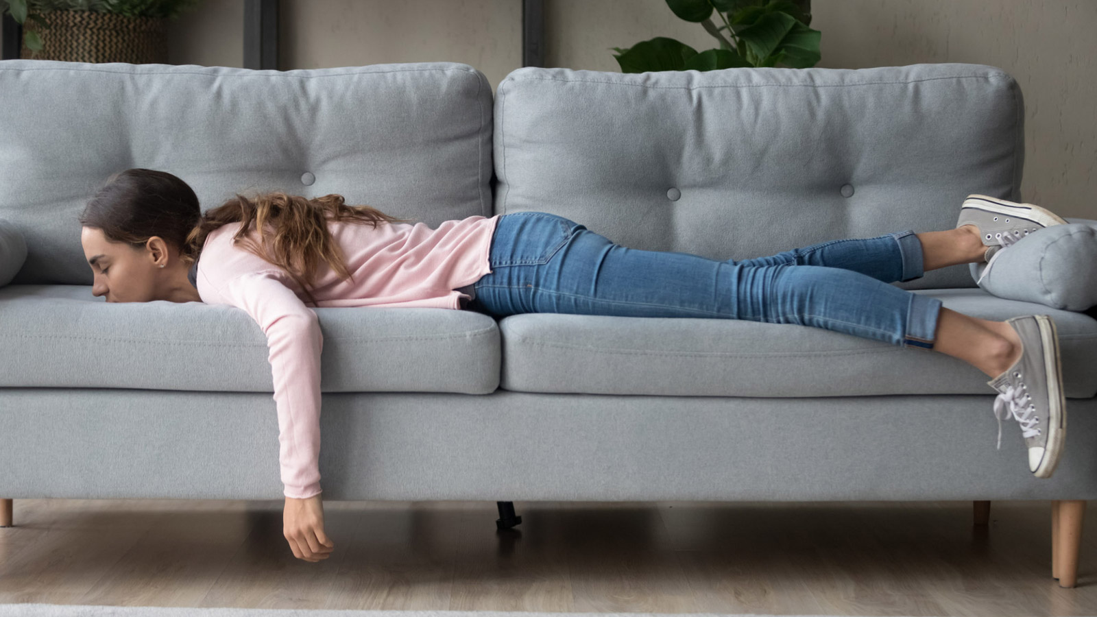 Girl resting on couch.